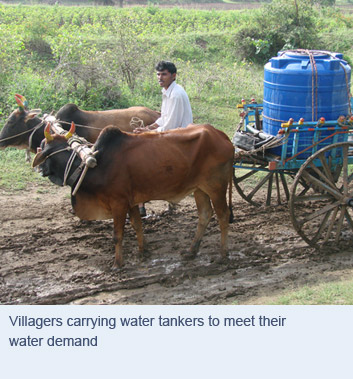 Villagers carrying water tankers to meet their water demand