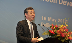 Jun Feng Li (Director General, National Climate Change Strategy Research an International Cooperation Center) at project event, May 2012